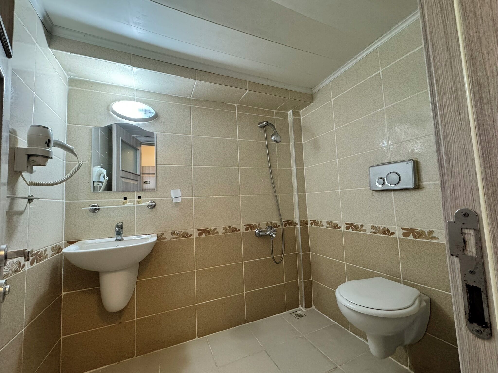 shower, free toiletries, hair dryer, slippers