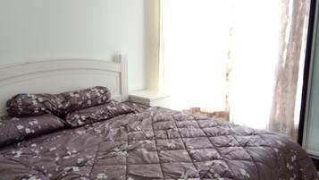 Basic Apartment | Desk, blackout curtains, iron/ironing board, bed sheets