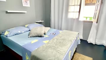 Suite estudio Confort, vista al mar | Caja de seguridad en la habitación y ropa de cama