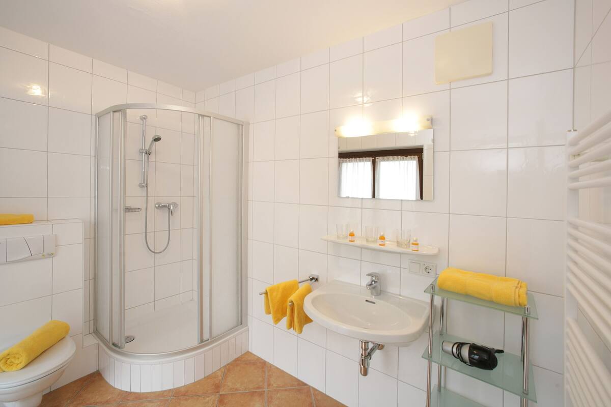 Comfort Condo | Bathroom | Deep soaking tub, free toiletries, hair dryer, bathrobes