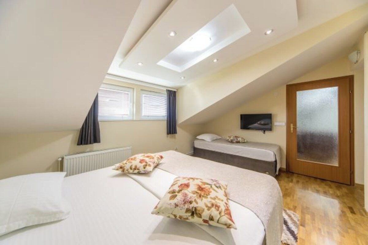 Premium bedding, laptop workspace, soundproofing