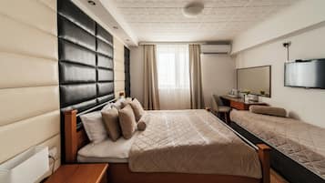 Premium Triple Room | Premium bedding, laptop workspace, soundproofing, iron/ironing board