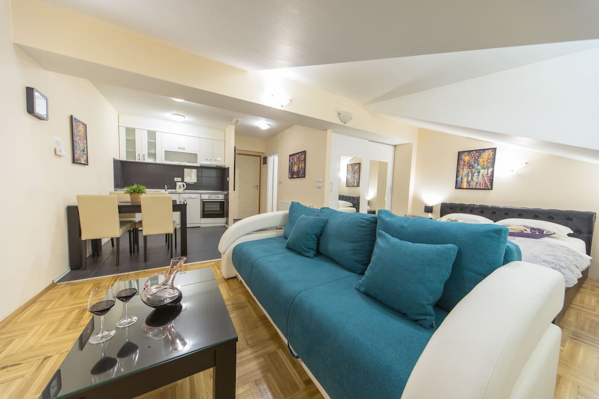Superior Studio | Living area | Flat-screen TV