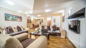 Comfort Apartment | Living area | Flat-screen TV