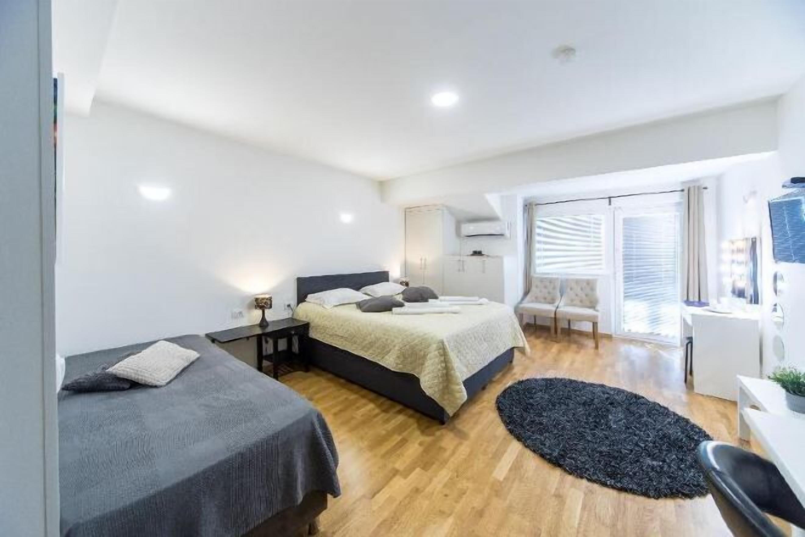 Premium bedding, laptop workspace, soundproofing, iron/ironing board