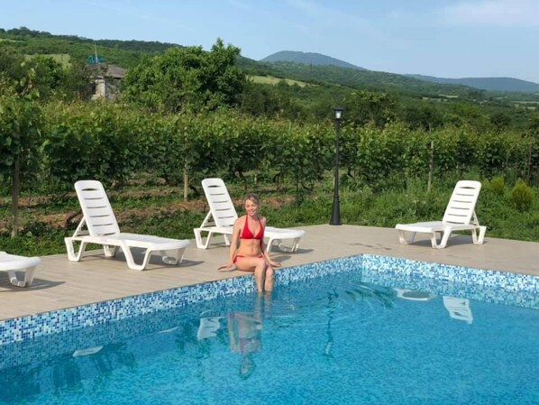 Outdoor pool, sun loungers