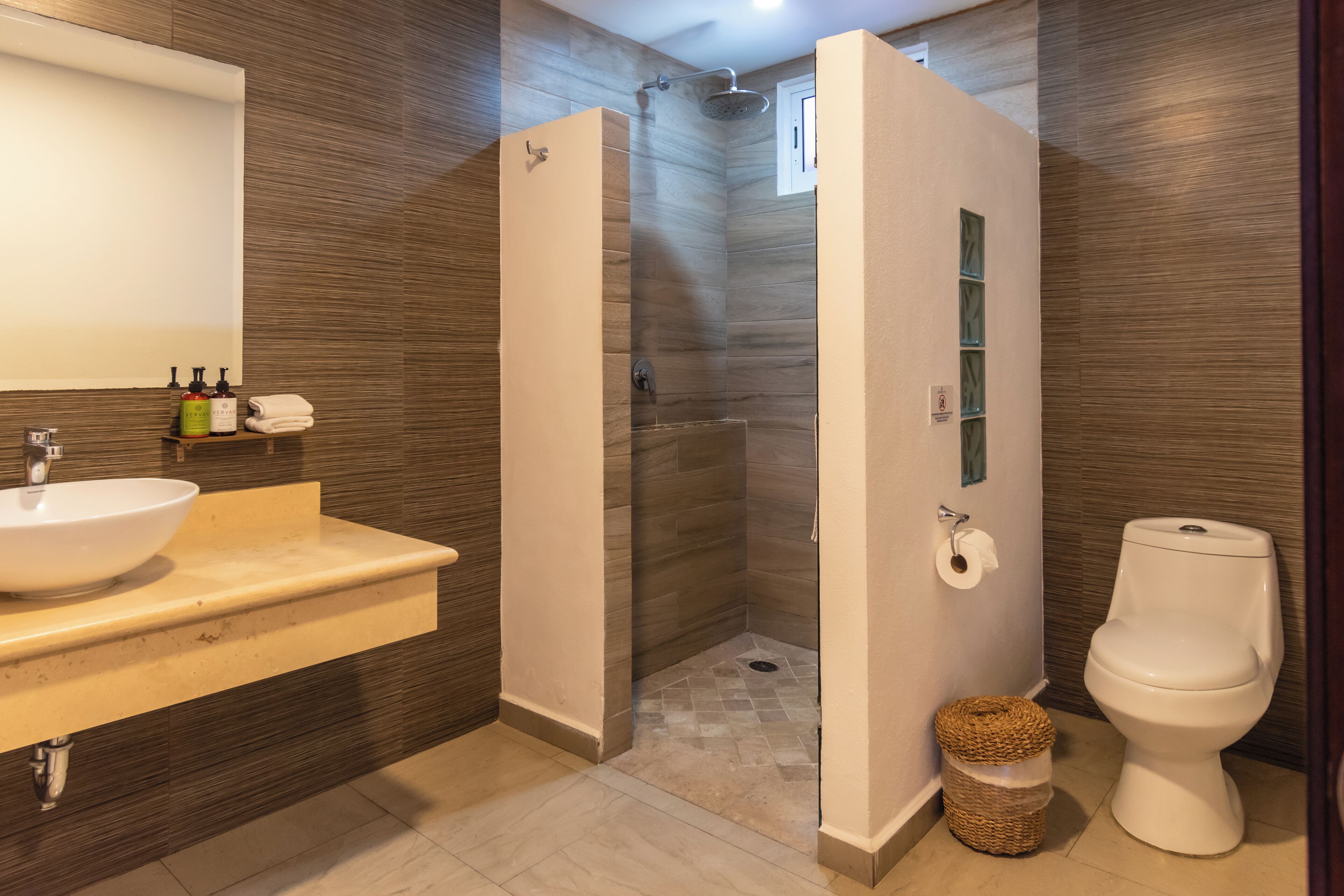 superior studio suite, sea view | bathroom | shower, free toiletries, hair dryer, towels