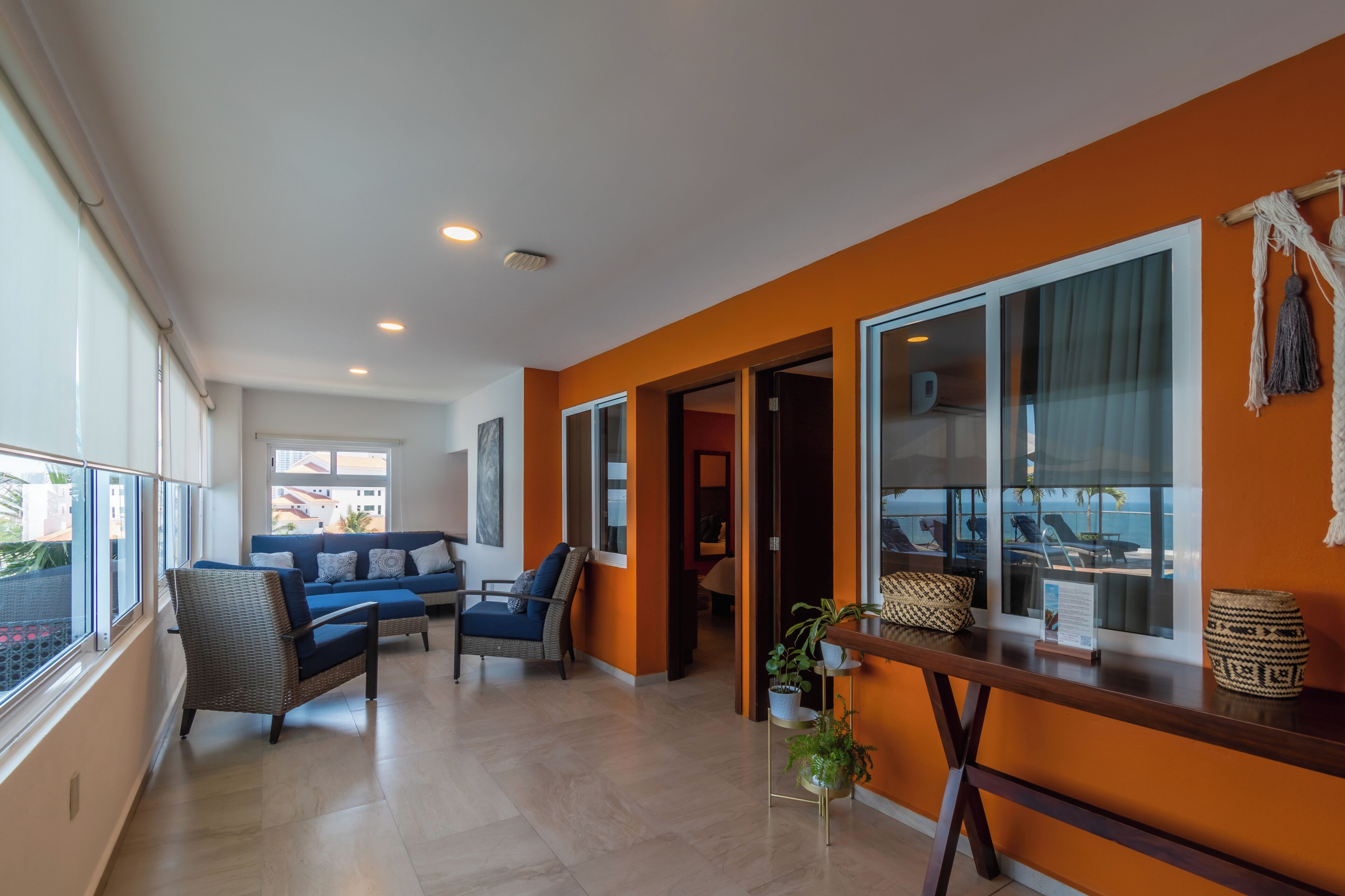 exclusive penthouse, multiple beds, private pool, beachfront | living area | 40-inch smart tv with cable channels, tv