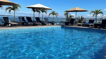 Outdoor pool, open 9:00 AM to 9:00 PM, pool umbrellas, sun loungers