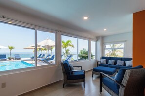 Exclusive Penthouse 2- Casa Doña Ernestina with private terrace 360 and plunge pool | Living area | 40-inch Smart TV with cable channels, TV - The Paramar Beachfront Boutique Hotel - Downtown Malecon (Puerto Vallarta)