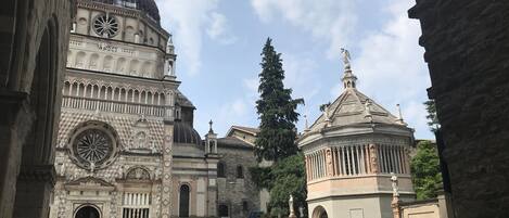 A historic building with a large dome and intricate architectural details.