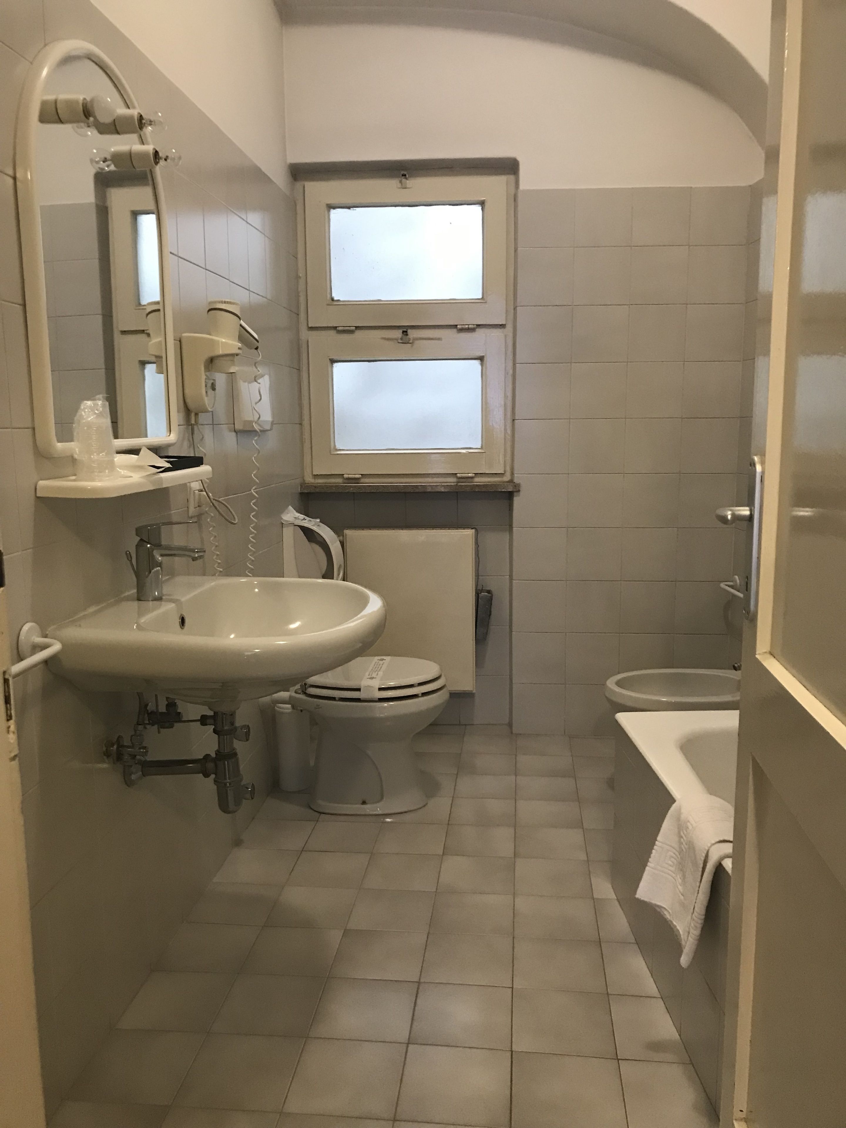 hair dryer, bidet, towels, soap