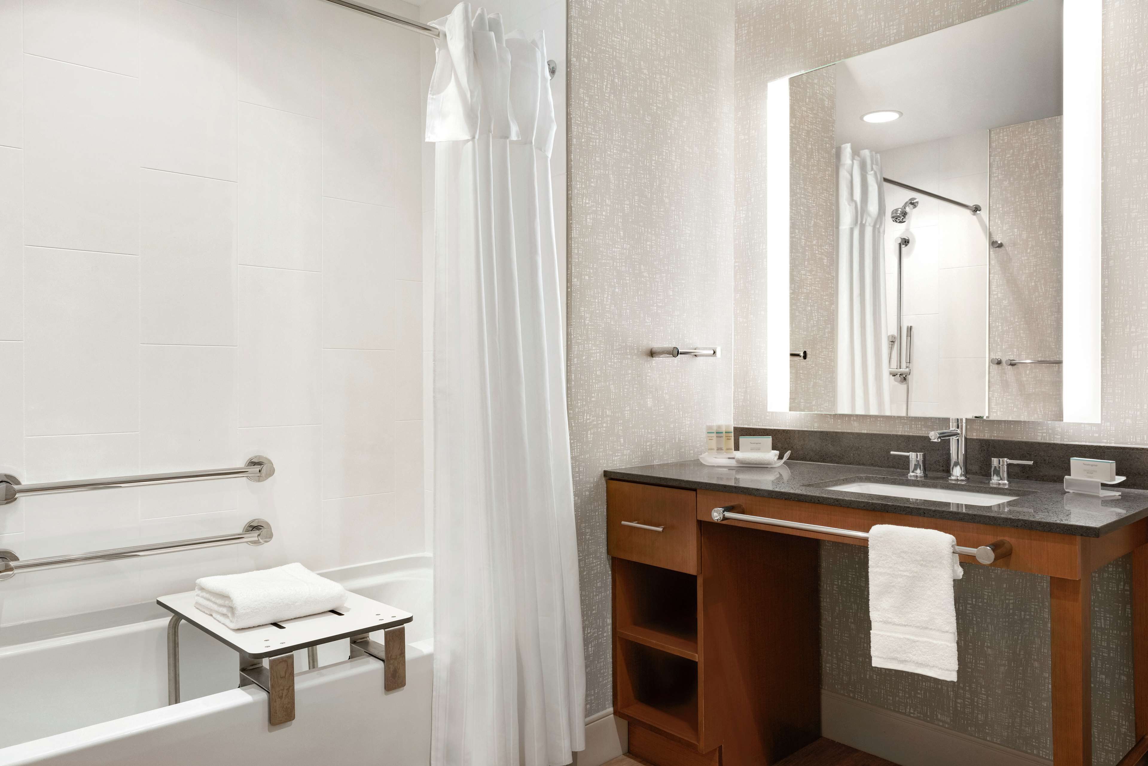 combined shower/bathtub, free toiletries, hair dryer, towels