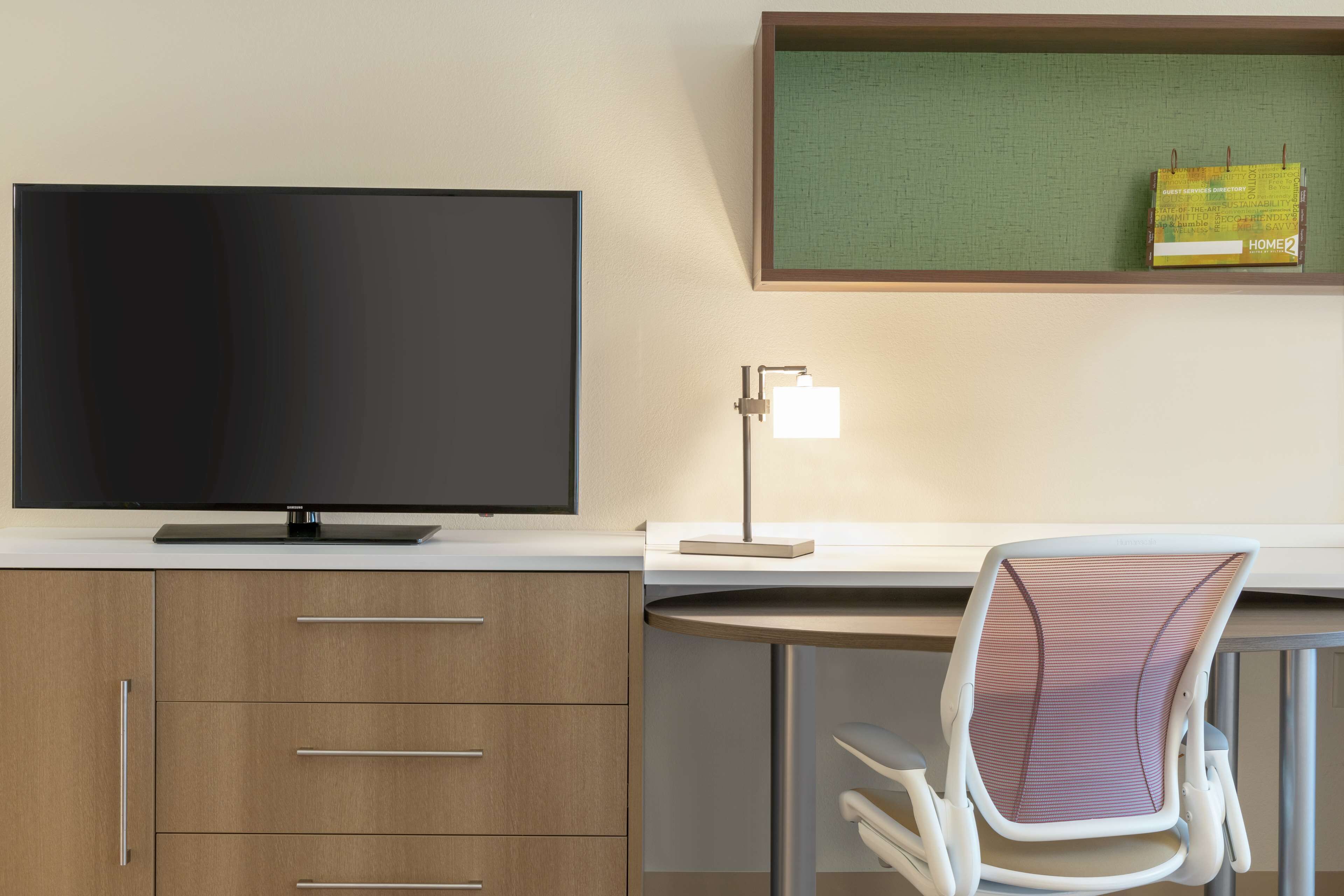 desk, laptop workspace, blackout curtains, iron/ironing board