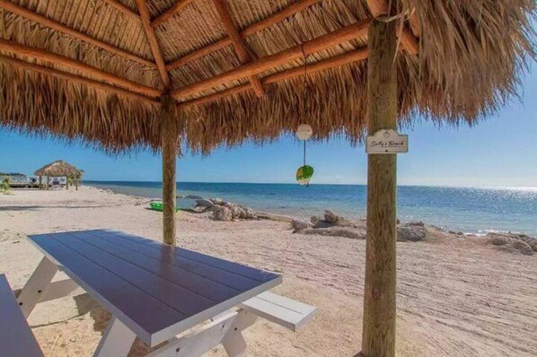 On the beach, sun loungers, beach towels