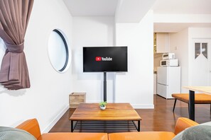 Apartamento (Bloom Nagahori 704) | Zona de estar | Una televisión de pantalla plana