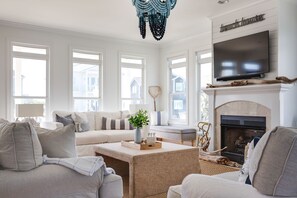 Smart TV, fireplace, books