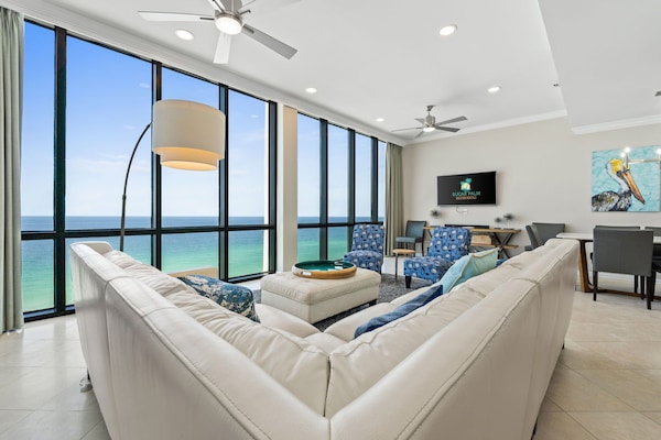 Relax and enjoy the view from the gorgeous living room in this penthouse.