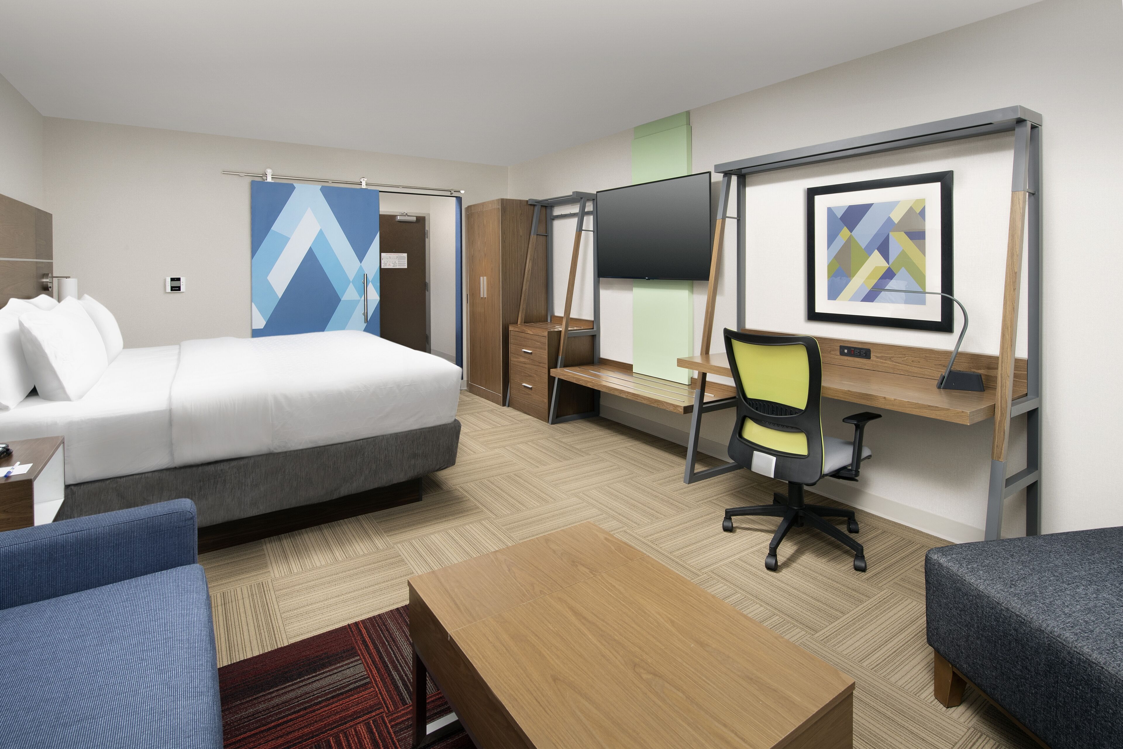 pillow-top beds, desk, laptop workspace, blackout curtains