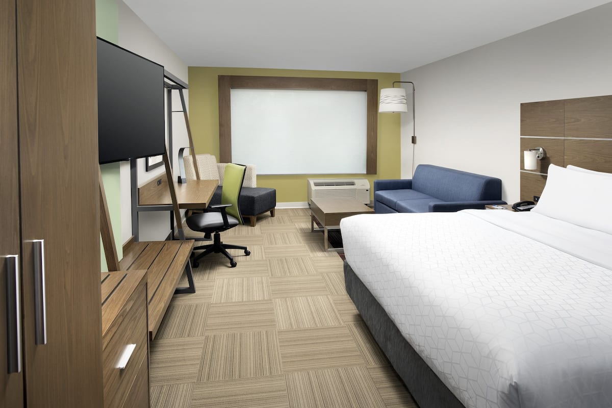 Suite, 1 King Bed with Sofa bed | Pillowtop beds, desk, laptop workspace, blackout drapes