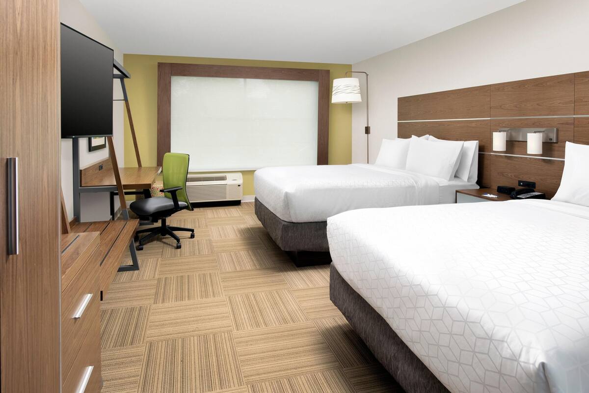 Pillow-top beds, desk, laptop workspace, blackout curtains