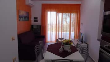 Appartement Panoramique | Coin séjour | Télévision à écran plat