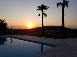 Seasonal outdoor pool, pool umbrellas, sun loungers