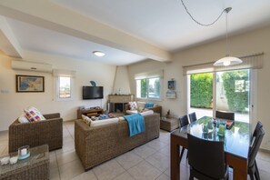 Villa, 3 Bedrooms, Private Pool | Living room | Flat-screen TV, fireplace - Protaras Villa Lindos 22 (Paralimni)