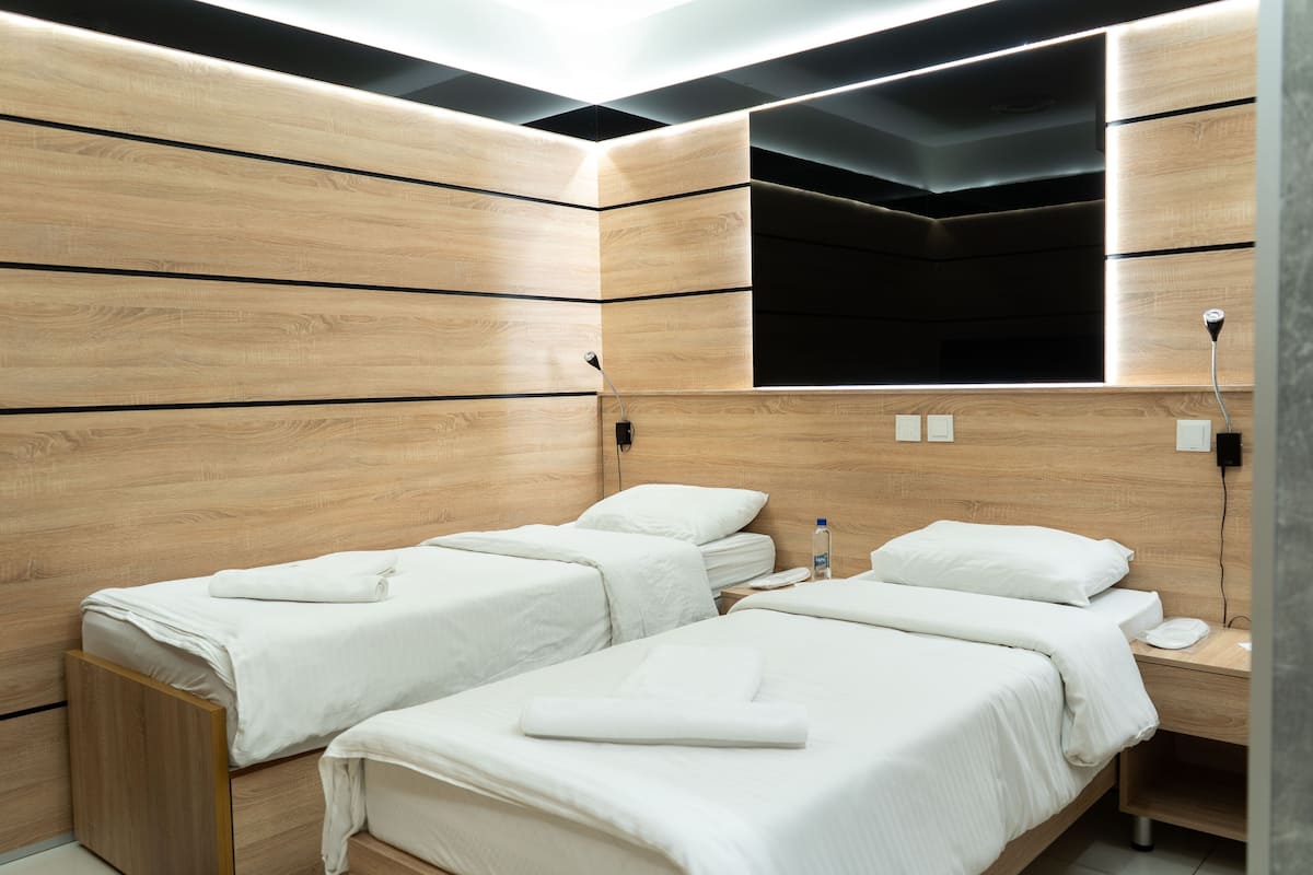 Laptop workspace, free WiFi, bed sheets