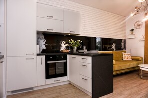 City Apartment | Private kitchen | Full-size fridge, oven, stovetop, dishwasher