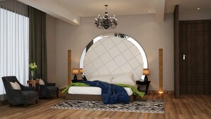 Un dormitorio moderno con una cama grande, dos mesitas de noche, una araña y un amplio ventanal con cortinas.