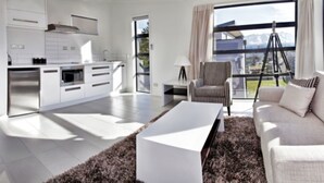 Apartment, 1 Bedroom, Non Smoking | Living room | Flat-screen TV - Tenby Apartments (Wanaka)