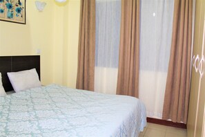 Executive appartement | 2 slaapkamers, individueel gemeubileerd, een bureau, een laptopwerkplek