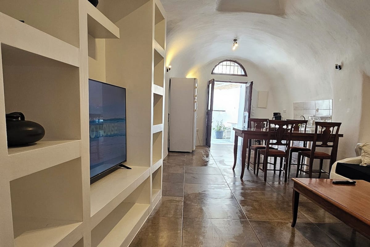 Casa | Tabla de planchar con plancha, wifi gratis y ropa de cama