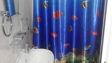 Shower, free toiletries, hair dryer, slippers