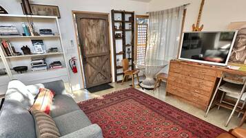 Design Cabin, Garden View | Living area | Flat-screen TV