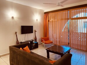 Classic Apartment, 2 Bedrooms | Living area | 42-inch LED TV with digital channels, TV, DVD player - Barizi Holiday Apartments (Mtwapa)