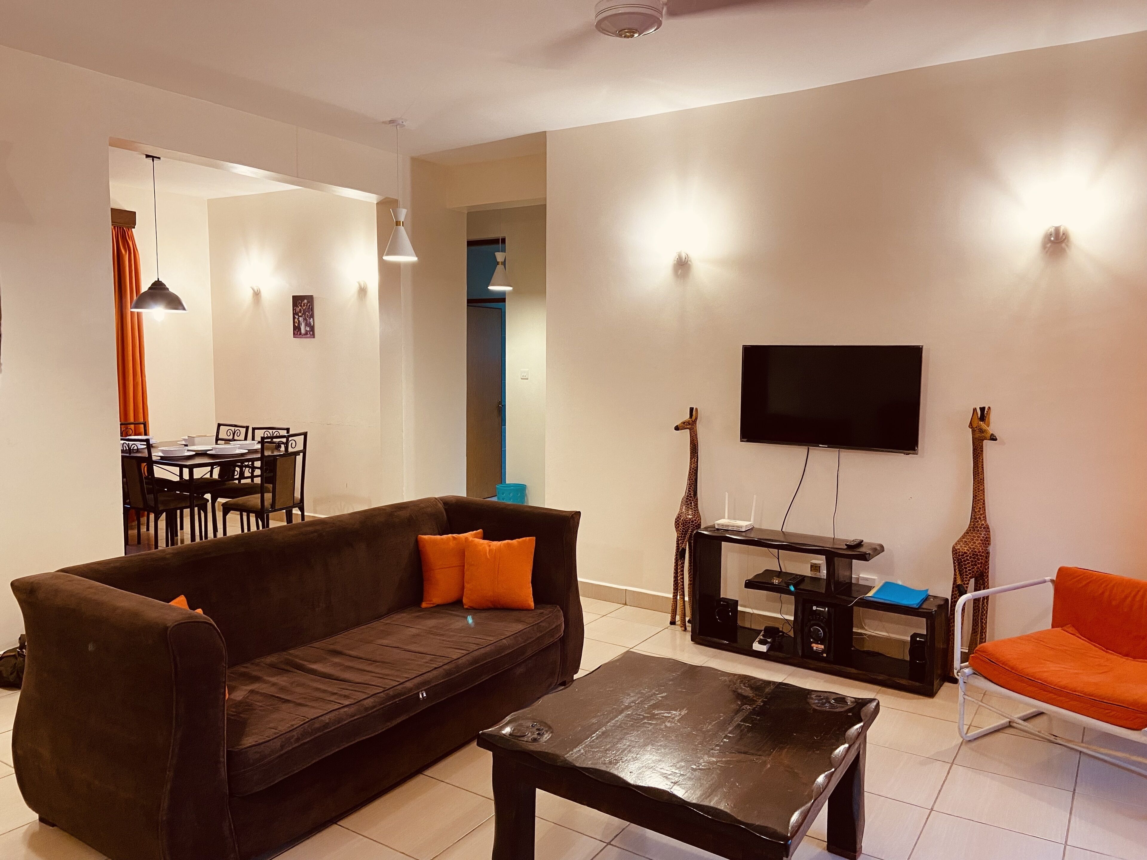 Classic Apartment, 2 Bedrooms | Living area | 42-inch LED TV with digital channels, TV, DVD player