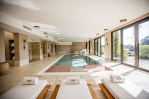 Indoor pool, seasonal outdoor pool, free pool cabanas, pool loungers