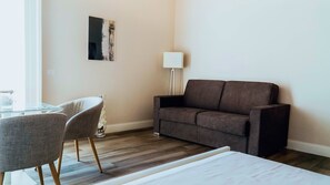 Deluxe Quadruple Room, 1 Double Bed with Sofa bed | Down comforters, in-room safe, individually decorated - Villa Cua (Ercolano)