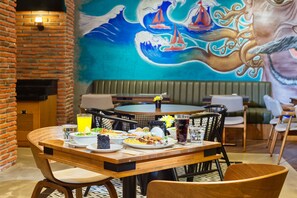 Breakfast, lunch, dinner served; international cuisine 