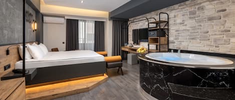 Comfort Suite, 1 Queen Bed, Jetted Tub, Partial Sea View | 1 bedroom, minibar, in-room safe, desk