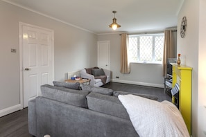 Astley 3 Bedroom House | Living room | Flat-screen TV