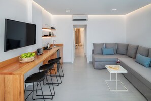 Deluxe Suite | Living area | Smart TV - Harmony Suites (Santorini)