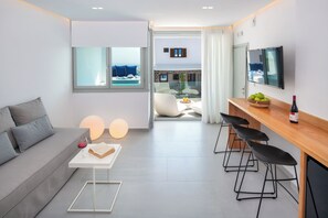 Deluxe Suite | Living area | Smart TV - Harmony Suites (Santorini)