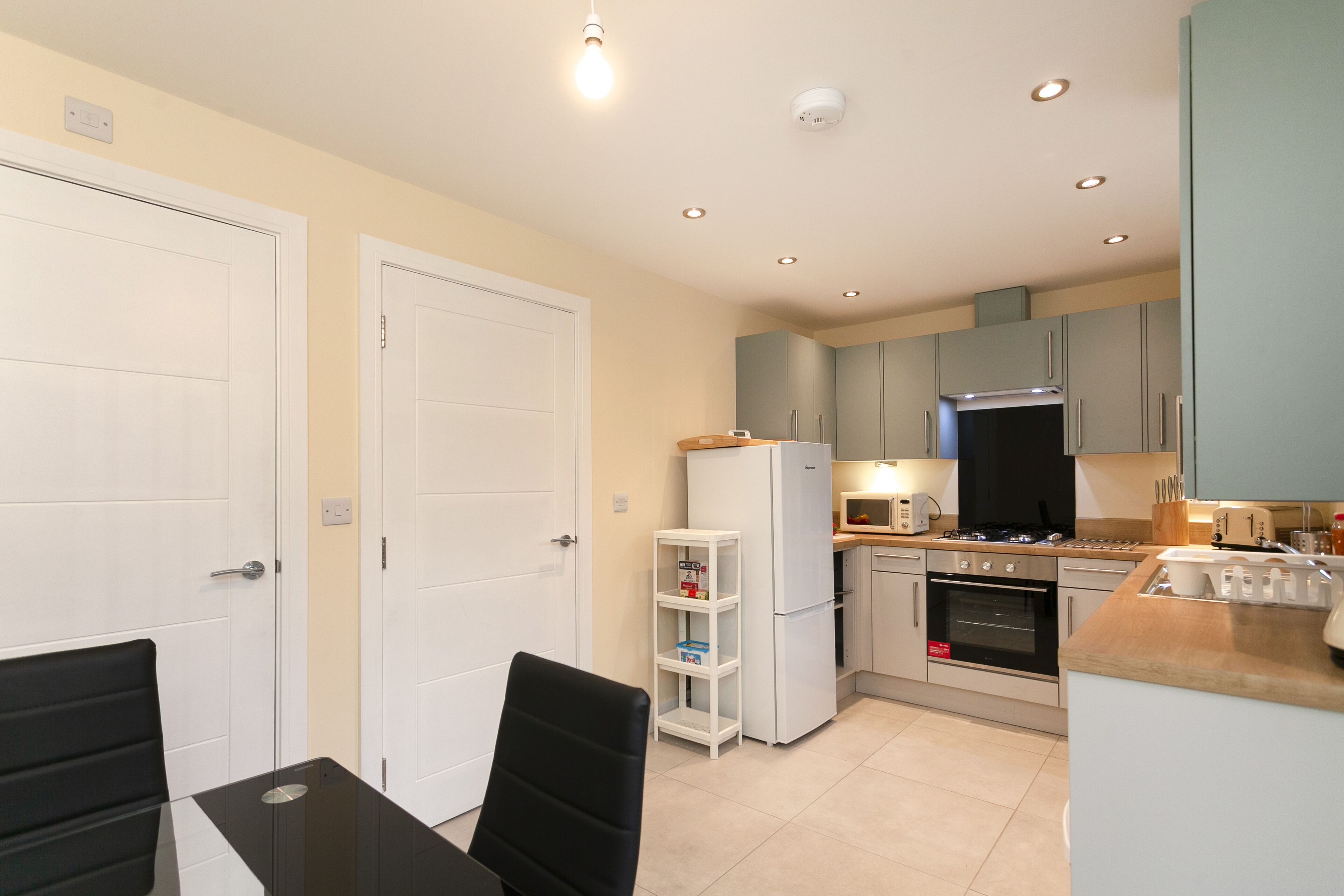 Condron 3 Bedroom House | Private kitchen | Fridge, microwave, cookware/dishes/utensils