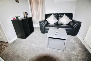 Woodstock A 1 Bed Apartment (2) | Living area | Flat-screen TV