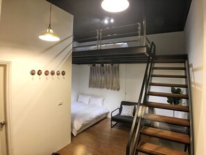 Suite estándar | Escritorio, cortinas blackout, wifi gratis y ropa de cama 