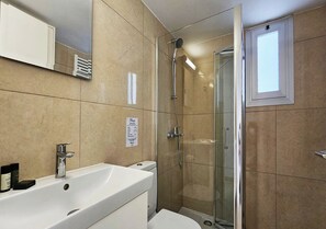 Apartment, 2 Bedrooms | Bathroom | Shower, free toiletries, hair dryer, towels