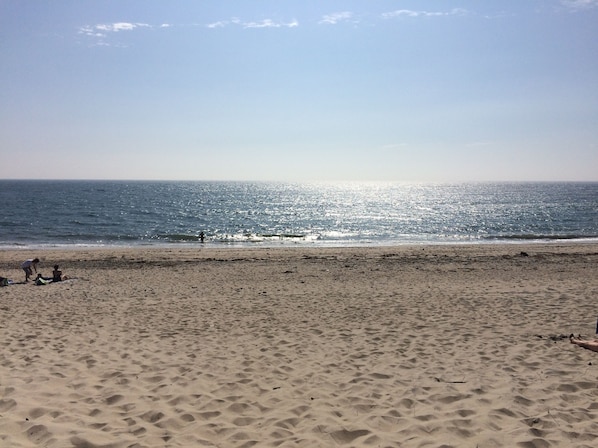 On the beach, sun-loungers, beach towels